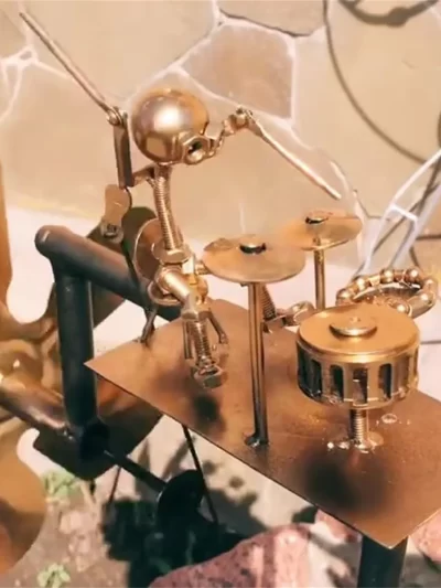 2025 New Metal Drummer Windmill Statue