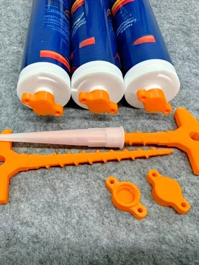 Silicone seal cap and seal gun nozzle removal tool, silicone seal cap used for open core tubes to prevent rapid drying